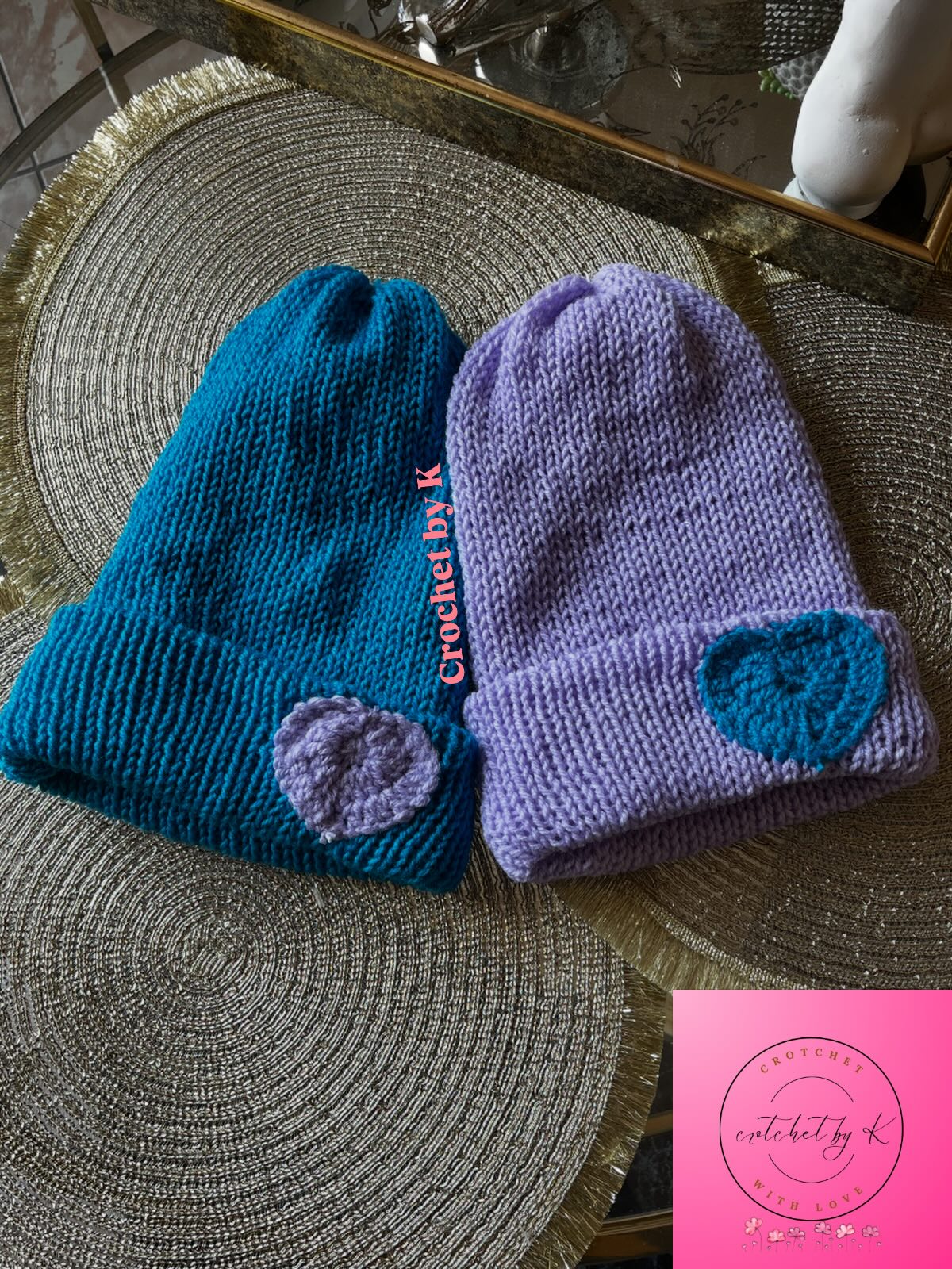 Blue crochet cardigan with pink hearts